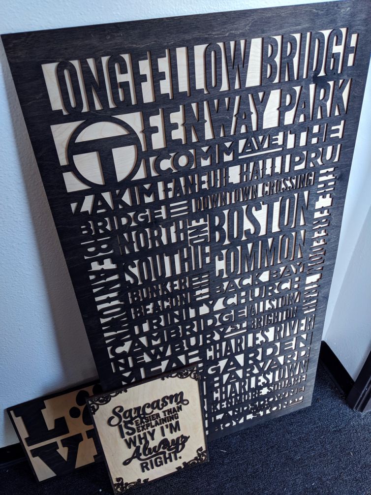 Laser cut and engraved wood panel artwork