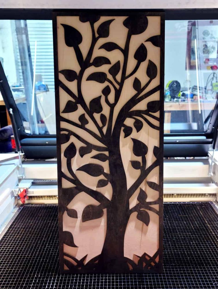 Laser cut stained glass layered wood